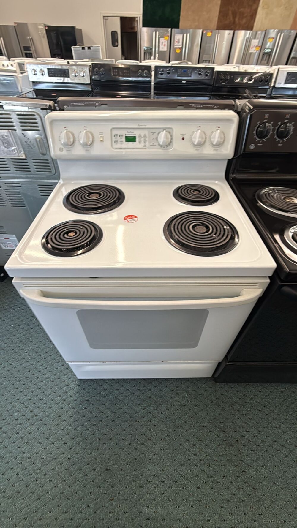 GE 30" Used 4 coil top Electric Stove With Warranty