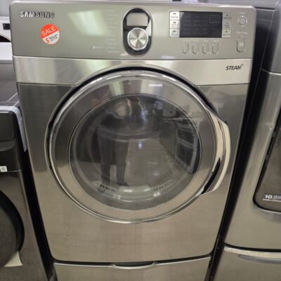 A reliable pre-owned Samsung electric dryer finished in classic white, displayed on the Appliance World showroom floor, showcasing its wide-opening front door, clean console display panel, and excellent pre-owned condition, ready for local delivery in Richmond, VA.