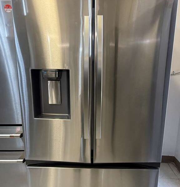 Samsung 3-door French door refrigerator in fingerprint resistant stainless steel with external ice and water dispenser.