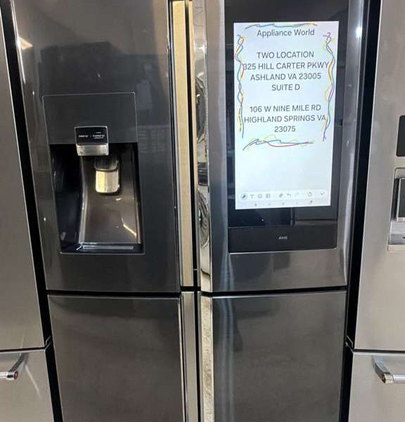 Samsung Black Stainless Steel Family Hub 4-Door Flex refrigerator with smart touchscreen.